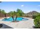 Beautiful backyard pool with mature landscaping and scenic views in a private setting at 31221 N 130Th Ln, Peoria, AZ 85383