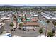 A scenic aerial view of a vibrant residential community showcasing the community pool and recreation center at 4065 E University -- # 433, Mesa, AZ 85202