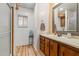 Bathroom featuring a single sink vanity and updated flooring at 4065 E University -- # 433, Mesa, AZ 85202