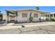 Charming single-story home with desert landscaping, covered porch, and carport at 4065 E University -- # 433, Mesa, AZ 85202