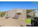 Exterior view showing desert landscaping, air conditioner and awning window at 4065 E University -- # 433, Mesa, AZ 85202