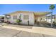 Charming single-story home with desert landscaping, carport, and decorative touches at 4065 E University -- # 433, Mesa, AZ 85202