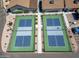 Aerial view of pristine pickleball courts surrounded by landscaped pathways and community buildings at 4065 E University -- # 433, Mesa, AZ 85202