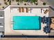 Aerial view of a sparkling community pool with lounge chairs and well-maintained concrete pool deck at 4065 E University -- # 433, Mesa, AZ 85202