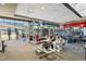 Well-equipped fitness center featuring state-of-the-art exercise machines and ample natural light at 42101 N Olympic Fields Ct, Anthem, AZ 85086