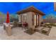 Outdoor kitchen space with built-in grill and ample counter space for entertaining at 42101 N Olympic Fields Ct, Anthem, AZ 85086