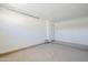Large garage featuring concrete floors and white walls at 43205 W Oster Dr, Maricopa, AZ 85138
