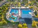 Aerial view of the community pool with water slides and recreational facilities at 4960 E Colonial Dr, Chandler, AZ 85249