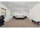 Large bedroom featuring recessed lighting, light wood floors, and contemporary furniture at 4960 E Colonial Dr, Chandler, AZ 85249