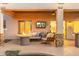Outdoor living area with a fire pit, seating, and covered patio at 4960 E Colonial Dr, Chandler, AZ 85249