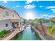 Lush backyard featuring a beautiful pool, landscaping, and lounge area at 4960 E Colonial Dr, Chandler, AZ 85249