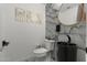 Stylish half bathroom with vessel sink, unique marble tiling, and elegant decor at 4960 E Colonial Dr, Chandler, AZ 85249