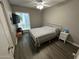Bedroom with dark wood laminate flooring and neutral colored walls at 5143 W Mountain View Rd, Glendale, AZ 85302