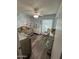 A Bedroom with a crib, changing table, rocker and neutral blue color scheme at 5143 W Mountain View Rd, Glendale, AZ 85302