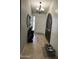 Inviting foyer with decorative mirrors, a console table, and eye-catching tiled flooring at 5143 W Mountain View Rd, Glendale, AZ 85302