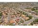 An aerial view of a home with a pool and solar panels in a suburban neighborhood at 5212 S Monte Vista St, Chandler, AZ 85249