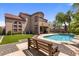 Beautiful backyard with a private pool, mature trees, and an inviting sitting area with bench at 5212 S Monte Vista St, Chandler, AZ 85249