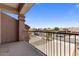 Balcony area features rod-iron railings with views of the street, surrounding homes and neighborhood at 5212 S Monte Vista St, Chandler, AZ 85249
