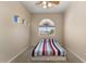 Cozy bedroom with neutral walls, carpet flooring, ceiling fan, and window with neighborhood view at 5212 S Monte Vista St, Chandler, AZ 85249