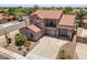 A two-story home with a three car garage and a well-manicured front yard at 5212 S Monte Vista St, Chandler, AZ 85249