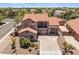 A two-story home with a three car garage and a well-manicured front yard at 5212 S Monte Vista St, Chandler, AZ 85249