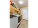 Functional laundry room with washer, dryer, and plenty of cabinet storage at 5212 S Monte Vista St, Chandler, AZ 85249