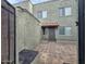 A townhome with a private patio and gate that leads to the front door at 5446 W Sheena Dr, Glendale, AZ 85306