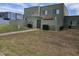 Exterior of a townhome in a community with green paint, front lawn and patio at 5446 W Sheena Dr, Glendale, AZ 85306