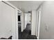 Hallway has neutral colored carpet and white walls at 5446 W Sheena Dr, Glendale, AZ 85306