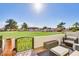 Inviting back patio with stylish seating and views of the community golf course at 6131 N 28Th Pl, Phoenix, AZ 85016