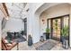 Relaxing patio with a dining table, comfortable seating, and tasteful decorations at 6131 N 28Th Pl, Phoenix, AZ 85016
