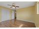 Spacious bedroom with wood floors and a double closet at 6217 E Dodge St, Mesa, AZ 85205