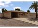 Single-story home with a front yard featuring desert landscaping at 6217 E Dodge St, Mesa, AZ 85205