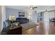 Inviting living room featuring laminate floors, calming blue walls, and comfortable, modern furniture at 6217 E Dodge St, Mesa, AZ 85205
