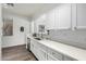 Modern kitchen with stainless steel appliances and white countertops at 6359 S Forest Ave, Gilbert, AZ 85298