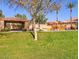 Community playground with mature trees, shade structures, and various play equipment provides fun for all at 6359 S Forest Ave, Gilbert, AZ 85298