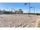Large community sand volleyball court with nets and lighting for recreational play at 6359 S Forest Ave, Gilbert, AZ 85298