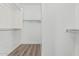 Walk-in closet with hanging rods and shelves is a fantastic feature for keeping your wardrobe impeccably organized at 6359 S Forest Ave, Gilbert, AZ 85298