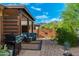 Outdoor area featuring a comfortable patio, nice grill and scenic desert views at 6939 S Red Hills Rd, Gold Canyon, AZ 85118