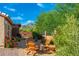 Relaxing backyard with comfortable seating and an inviting fire pit, perfect for entertaining at 6939 S Red Hills Rd, Gold Canyon, AZ 85118