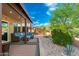 Relaxing backyard area with lush desert greenery and outdoor seating and mountain views at 6939 S Red Hills Rd, Gold Canyon, AZ 85118