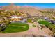 Overhead image of the golf course clubhouse, green, and desert landscape at 6939 S Red Hills Rd, Gold Canyon, AZ 85118