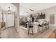 Open-concept kitchen with island and bar seating, perfect for entertaining and casual dining at 6939 S Red Hills Rd, Gold Canyon, AZ 85118