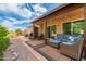 Inviting covered patio with comfortable seating, perfect for outdoor relaxation at 6939 S Red Hills Rd, Gold Canyon, AZ 85118