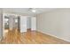 Bedroom featuring wood laminate flooring, ceiling fan, and a spacious closet at 713 W Boxelder Pl, Chandler, AZ 85225