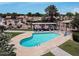 Community pool with lounge chairs and landscaped common areas at 713 W Boxelder Pl, Chandler, AZ 85225