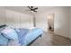 Bedroom with en-suite bathroom and closet with sliding doors at 7201 N 16Th Dr, Phoenix, AZ 85021