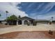 Charming single-story home with well-maintained landscaping and a circular driveway at 7201 N 16Th Dr, Phoenix, AZ 85021