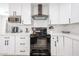 Modern kitchen featuring stainless steel appliances, white cabinets and quartz countertops at 7201 N 16Th Dr, Phoenix, AZ 85021