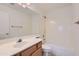 Neutral bathroom with a single sink vanity and shower-tub combo at 7344 E Flower Ave, Mesa, AZ 85208